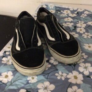 Vans Black and White Slip-On Sneakers